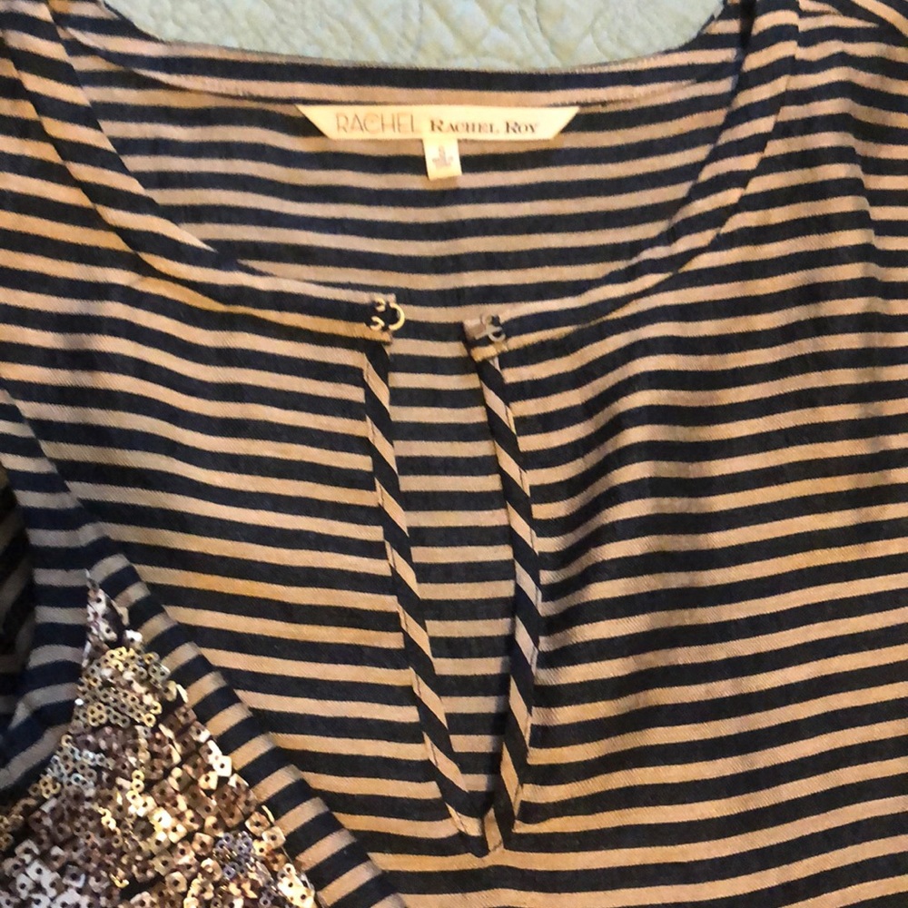 Silk sheath dress with sequined panels .